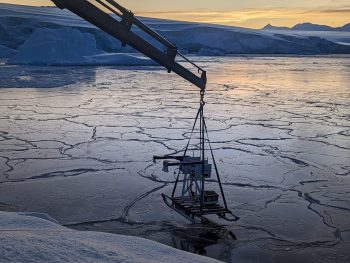 Figure 6. This photo shows the Ku- and Ka-band radar being deployed over newly forming sea ice off the coast of the Antarctic Peninsula near Rothera Station. ||Credit: X| High-resolution image 