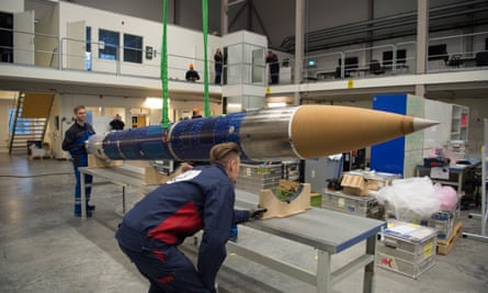 Mechanical engineers work on the SubOrbital Express (Maser 15) rocket in the dome building at the Esrange Space Center.