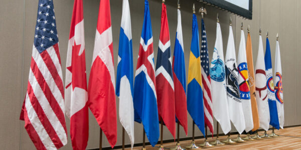 The flags of all members of the Arctic Council. Since Russia’s invasion of Ukraine, most of its work has been put to a hault. Photo: Linnea Nortstroem, Arctic Council