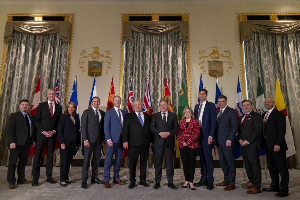 From left to right, Premier of Nunavut P.J. Akeeagok, Premier of the Northwest Territories R.J. Simpson, Premier of Alberta Danielle Smith, Premier of Manitoba Wab Kinew, Premier of Nova Scotia Tim Houston, Premier of Ontario Doug Ford, Premier of Québec François Legault, Premier of New Brunswick Susan Holt, Premier of British Columbia David Eby, Premier of Saskatchewan Scott Moe, Premier of Newfoundland and Labrador Andrew Furey, and Premier of Yukon Ranj Pillai, pose for a group photograph before speaking to reporters at the Mayflower Hotel in Washington, Wednesday, Feb. 12, 2025. THE CANADIAN PRESS/AP-Ben Curtis