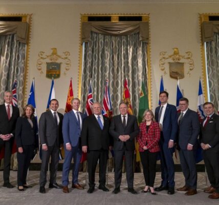 From left to right, Premier of Nunavut P.J. Akeeagok, Premier of the Northwest Territories R.J. Simpson, Premier of Alberta Danielle Smith, Premier of Manitoba Wab Kinew, Premier of Nova Scotia Tim Houston, Premier of Ontario Doug Ford, Premier of Québec François Legault, Premier of New Brunswick Susan Holt, Premier of British Columbia David Eby, Premier of Saskatchewan Scott Moe, Premier of Newfoundland and Labrador Andrew Furey, and Premier of Yukon Ranj Pillai, pose for a group photograph before speaking to reporters at the Mayflower Hotel in Washington, Wednesday, Feb. 12, 2025. THE CANADIAN PRESS/AP-Ben Curtis