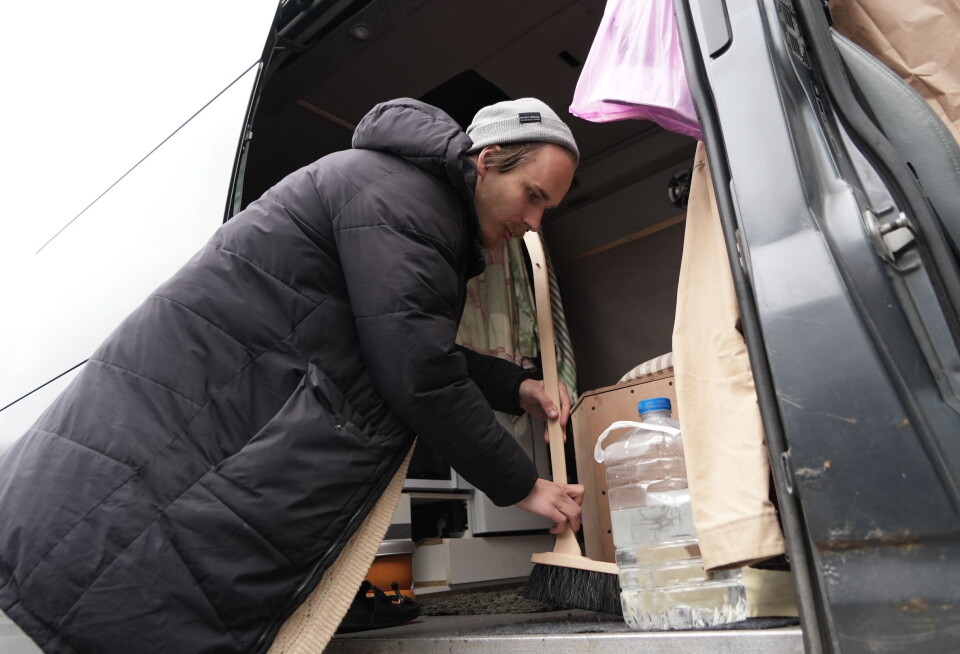 Miro cleaning his minivan