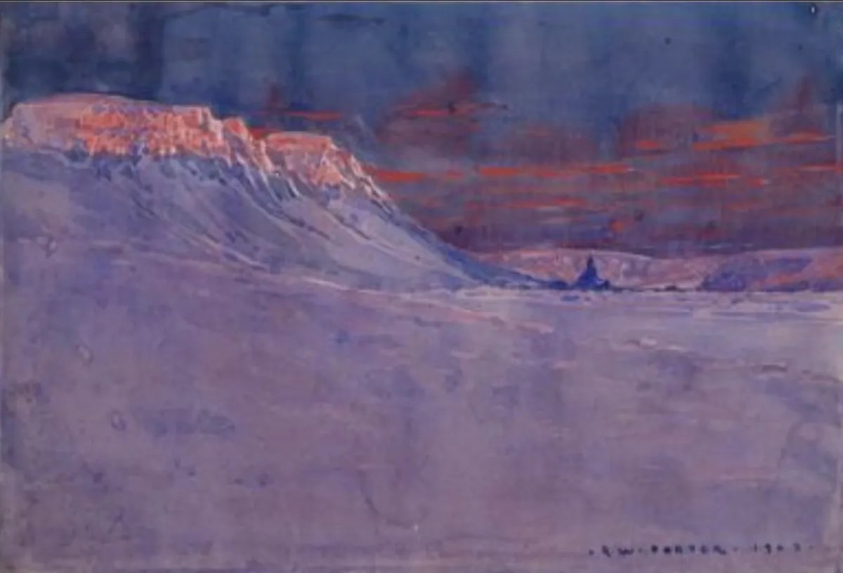 A snowy mountain landscape with pinkish light on the cliffs, icy ground, and a purple-blue sky with streaks of red clouds.