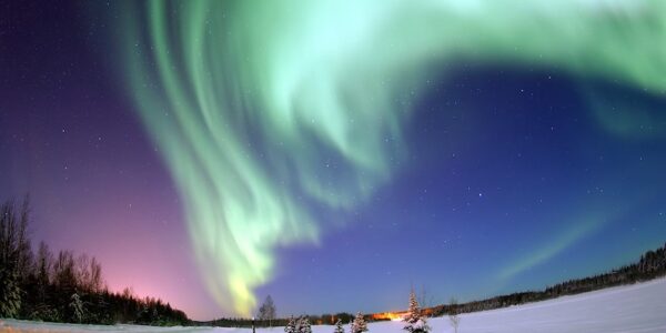 The Aurora Borealis, or Northern Lights shines above Eielson Air Force Base. (Senior Airman Joshua Strang, U.S. Air Force/Wikimedia Commons)