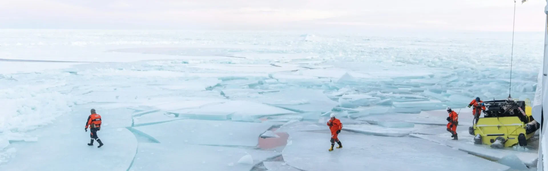 Coast guard works on ice in the Arctic region in January 2021 (Daniel Fatnes/Unsplash)