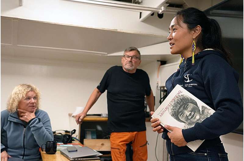 Miyuki Daorana (right) together with two lecturers from UiT; Ingvild Jensen and Jan-Erik Henriksen. The book Daorana is holding is about Arnarulunnguaq, who participated in one of the expeditions of the Danish adventurer Knud Rasmussen. Among other things, she mastered the art of carrying fire, protected by fish skin. Credit: Karine Nigar Aarskog/UiT