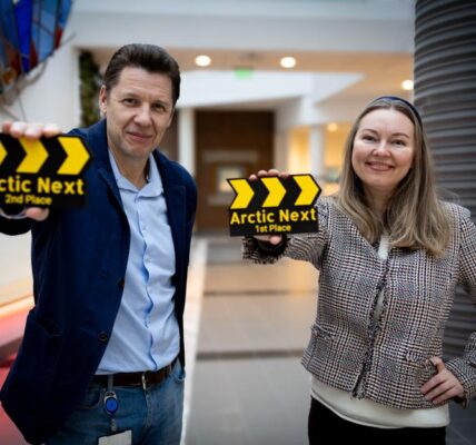 Advisor Andrey Kazakov and researcher Elena Sæther from the High North Center show off the trophy from the Arctic Next Innovation Challenge. The student competition was held for the first time this autumn and is being continued in the ArcticNext project. (Photo: Markus J. Thonhaugen/High North Center)
